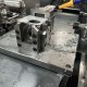 Multi-axis drilling and tapping of hardware die-casting parts