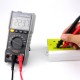 Portable Mini Digital Multimeter Auto-Ranging Electrician's Tool with DC/AC Voltage Current Resistance Capacitance Frequency Duty Cycle & Temperature